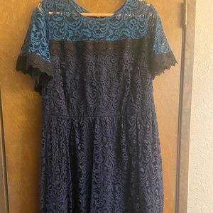 Lace midi length dress. Blue and black